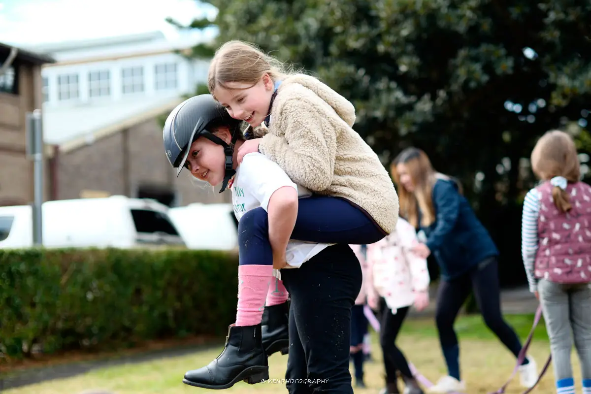 Children making friends at Eastside Riding Academy school holiday horse riding camp Sydney